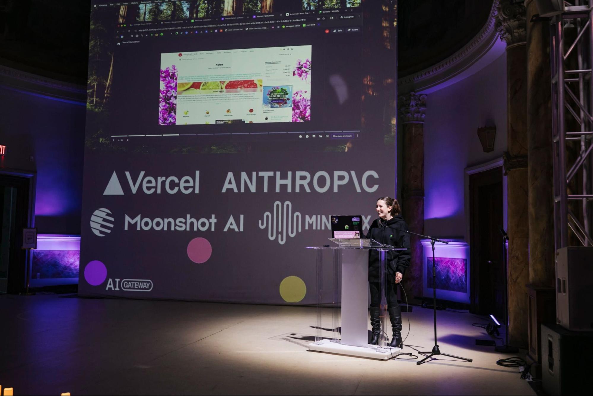 Photo of me presenting at Vercel hackathon